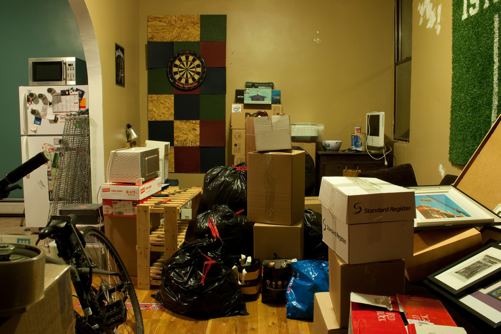 A messy apartment that is in need of a professional move out cleaning