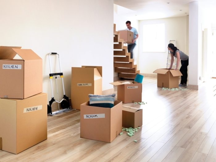 Labeling boxes to help stay organized in the moving process