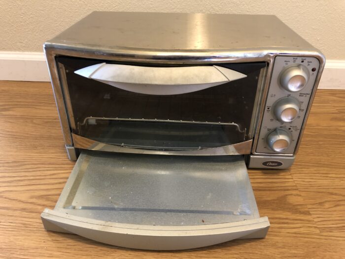 a toaster oven with the door open